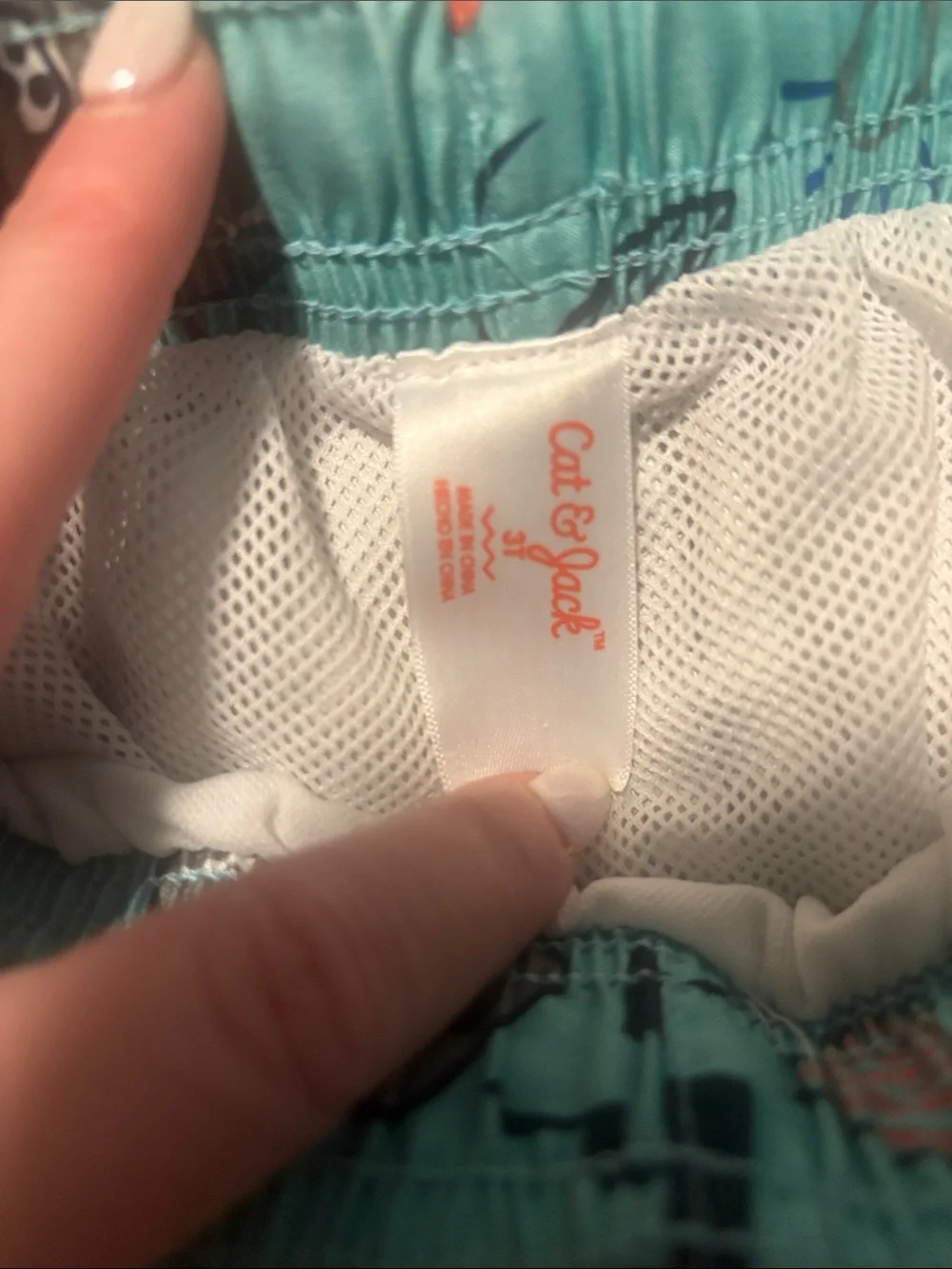 Cat & Jack Aqua Pirate Print Swim Trunks with Orange Accents